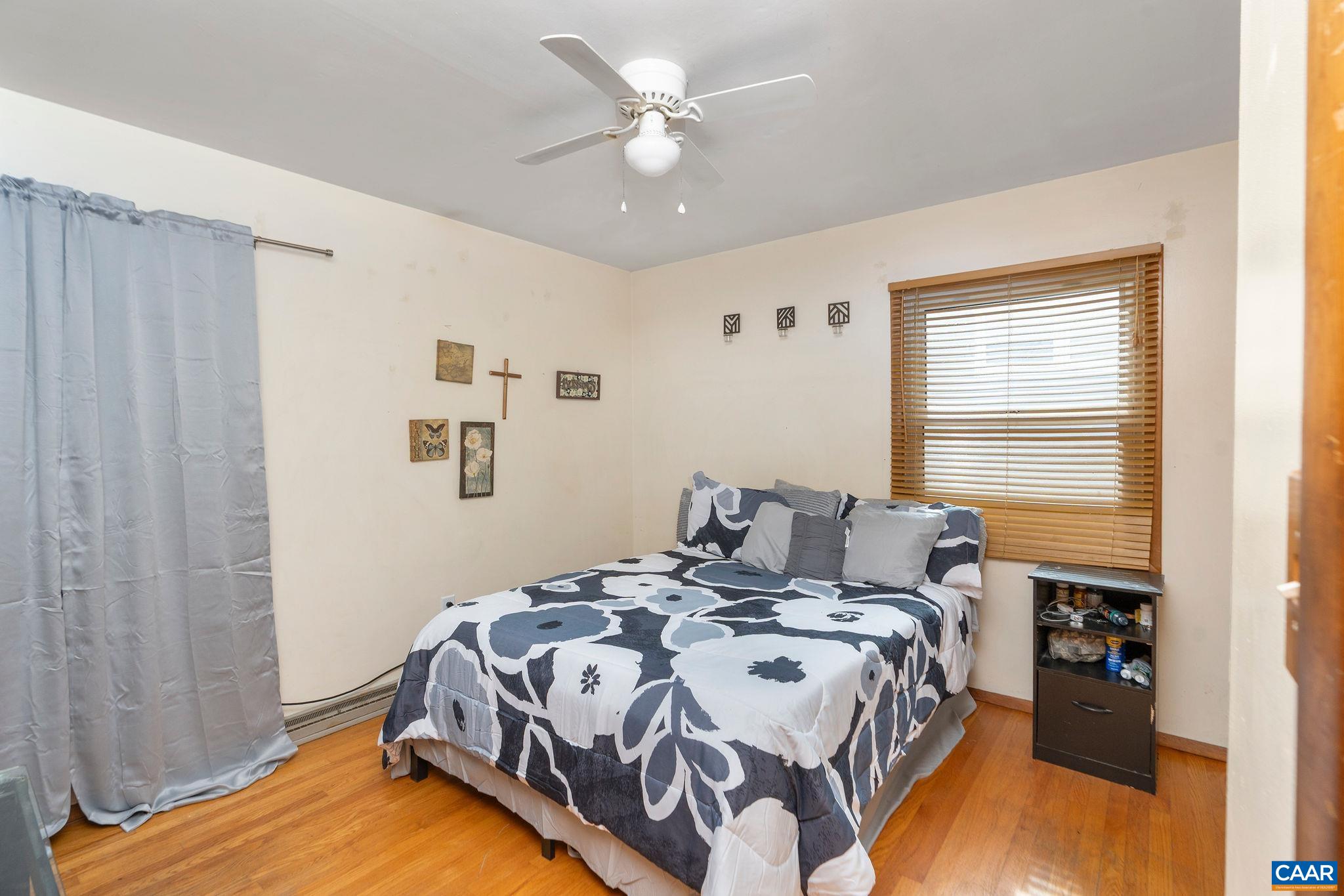 609 B Street Staunton, VA 24401 - Photo 12 of 33 a bedroom with a bed and a window