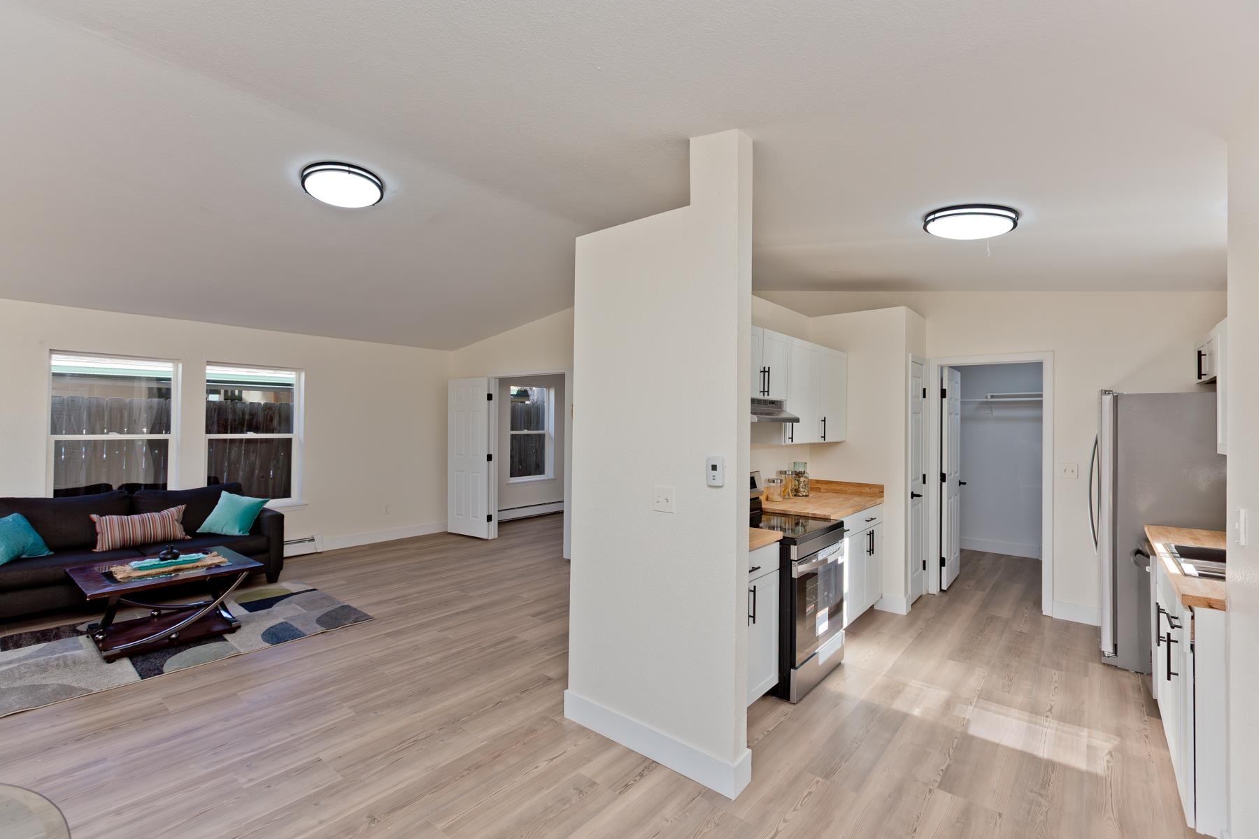 634 1/2 Colony Road Clifton, CO 81520 - Photo 11 of 42 a living room with furniture and a flat screen tv