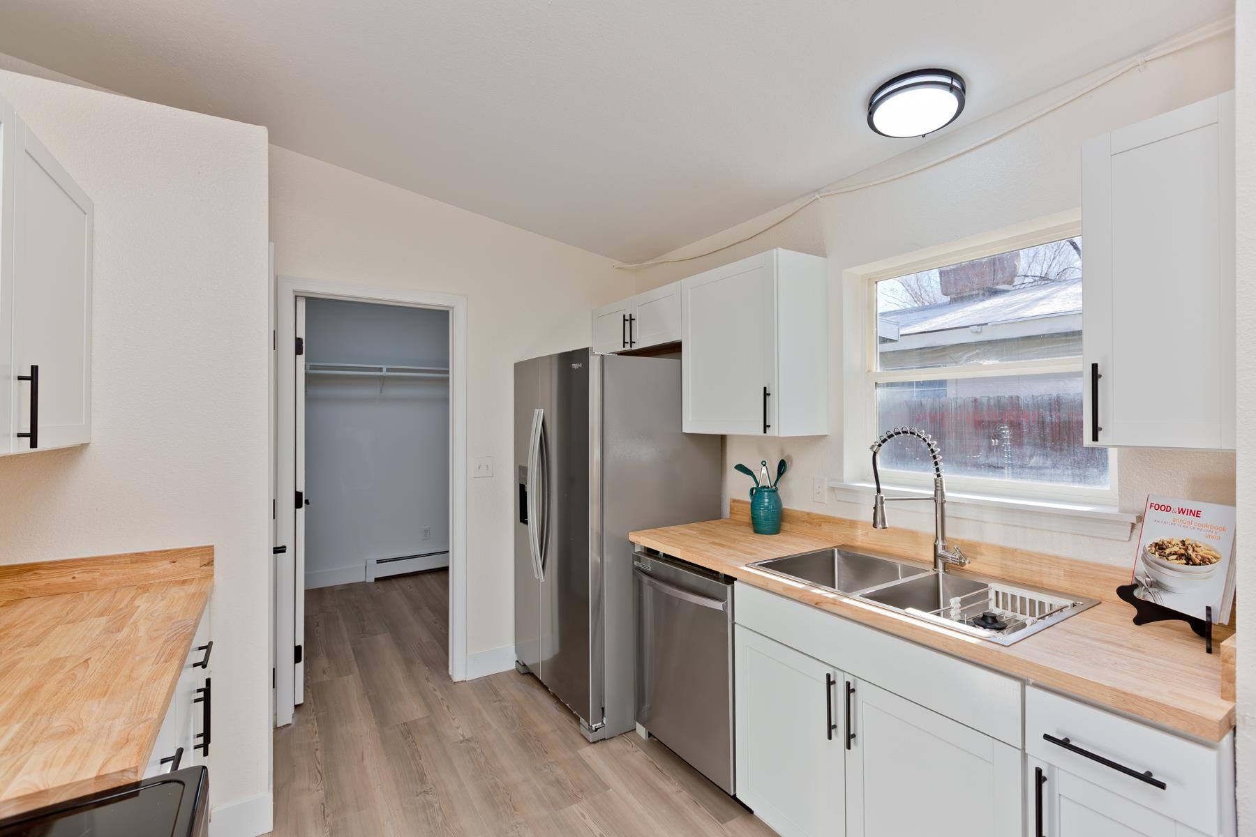 634 1/2 Colony Road Clifton, CO 81520 - Photo 13 of 42 a kitchen that has a refrigerator and a sink