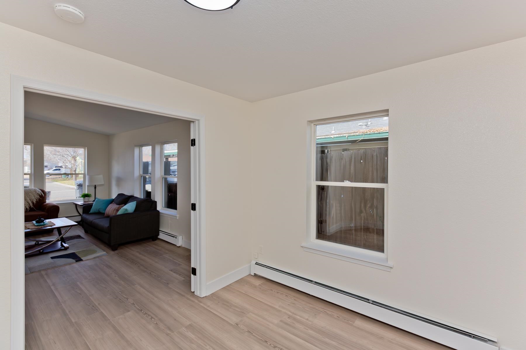634 1/2 Colony Road Clifton, CO 81520 - Photo 17 of 42 a living room with furniture and wooden floor