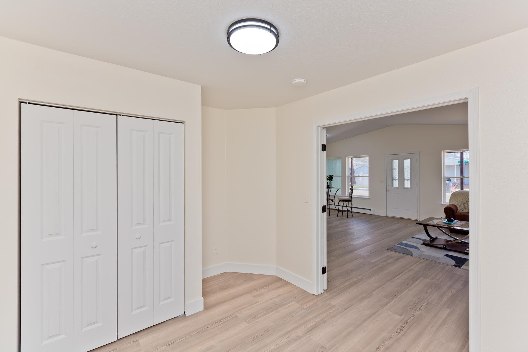 634 1/2 Colony Road Clifton, CO 81520 - Photo 18 of 42 a view of a livingroom with wooden floor