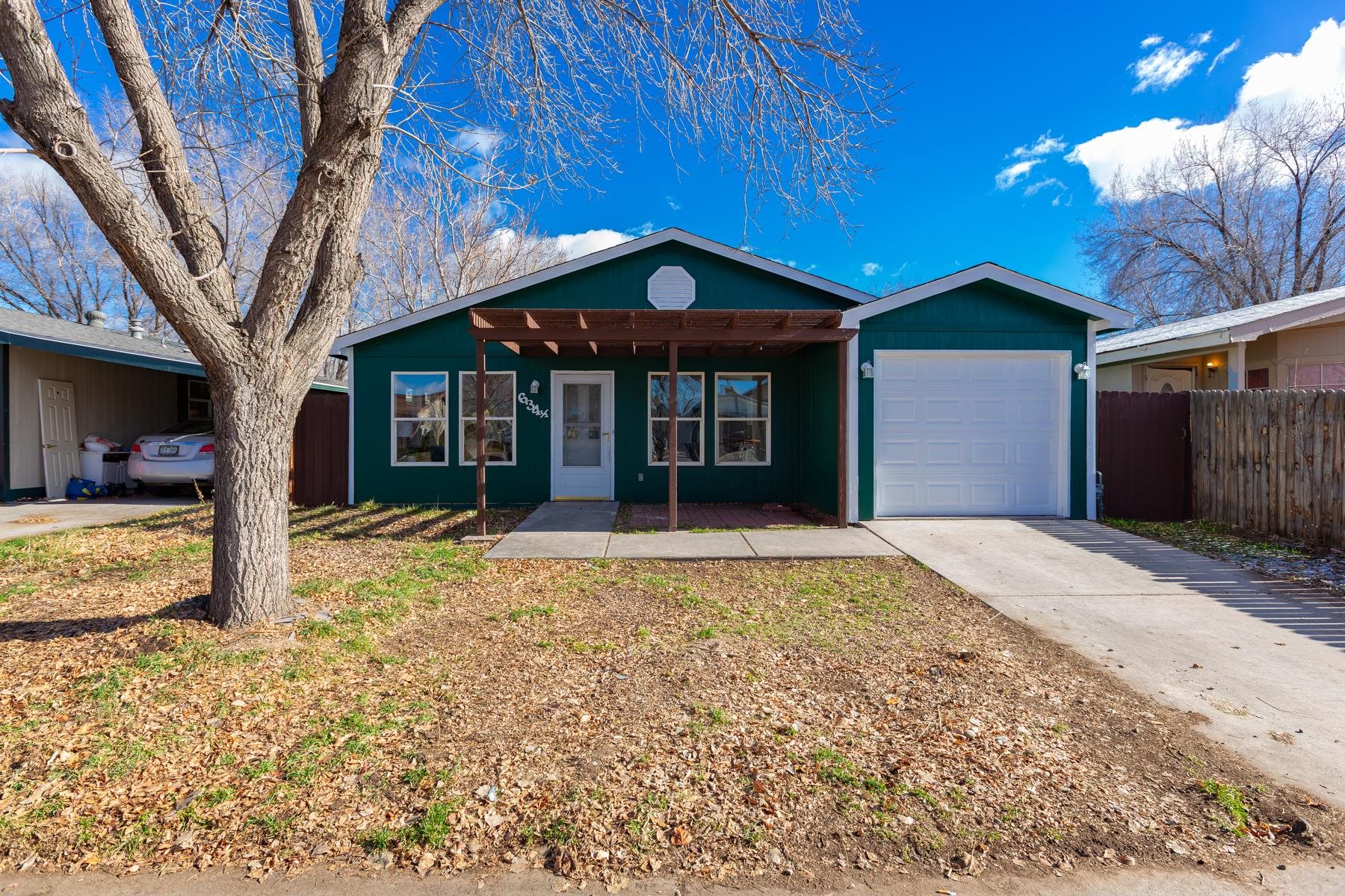 634 1/2 Colony Road Clifton, CO 81520 - Photo 2 of 42 a view of a house with a patio and a yard