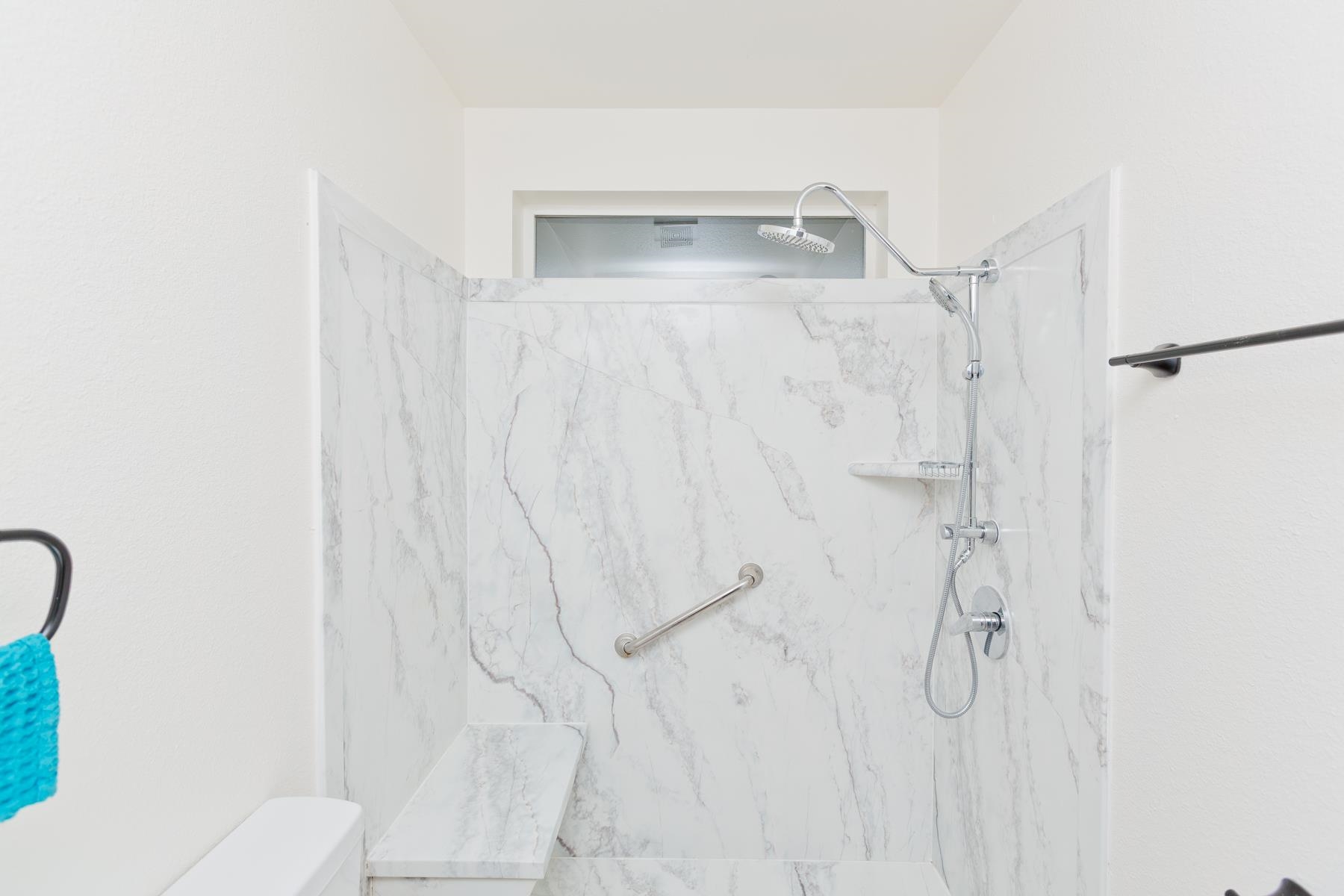 634 1/2 Colony Road Clifton, CO 81520 - Photo 21 of 42 a bathroom with a shower and a toilet