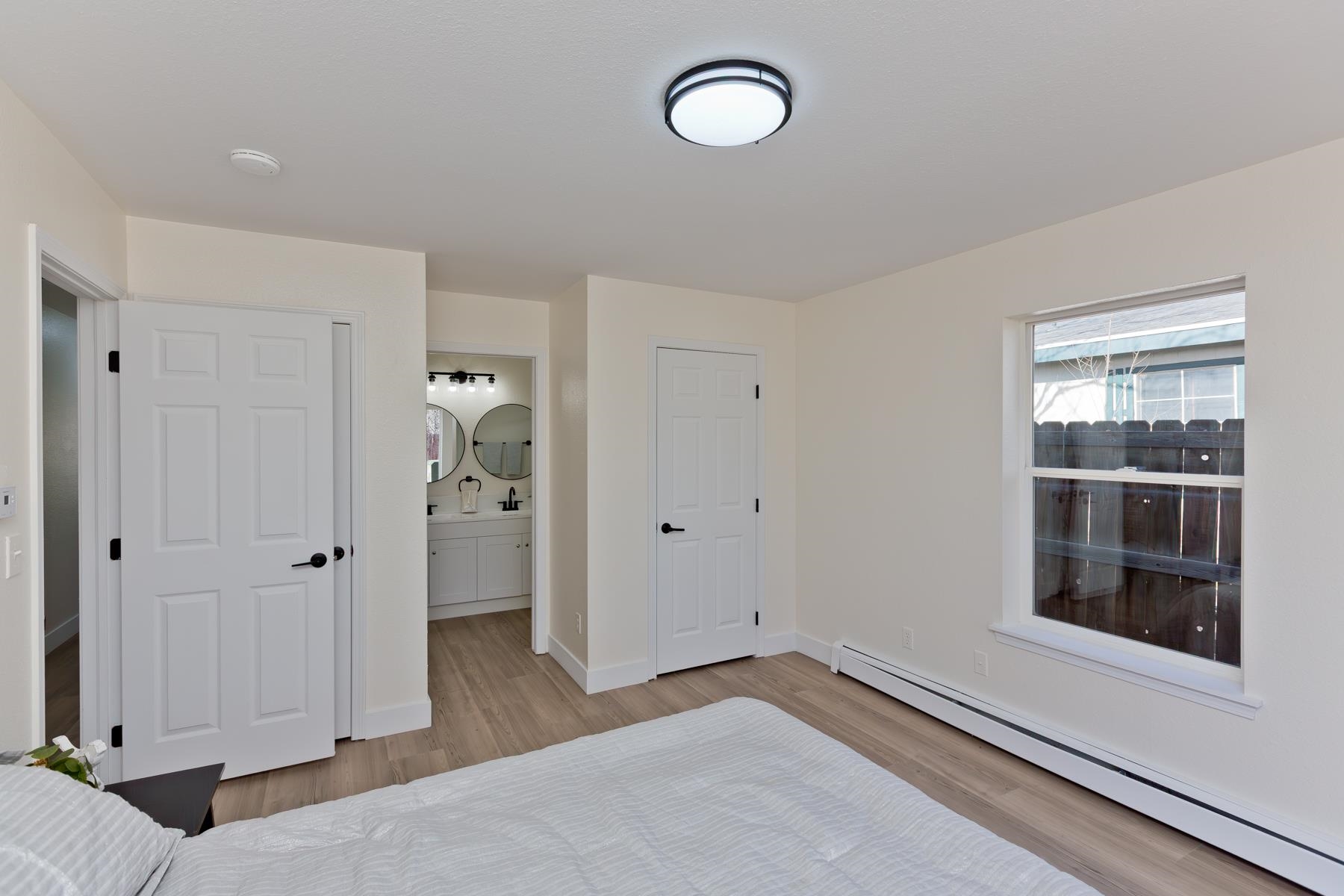 634 1/2 Colony Road Clifton, CO 81520 - Photo 27 of 42 a view of a room with wooden floor and window