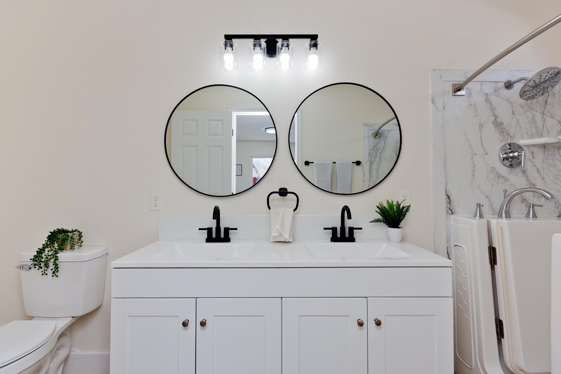 634 1/2 Colony Road Clifton, CO 81520 - Photo 29 of 42 a bathroom with a sink and a mirror
