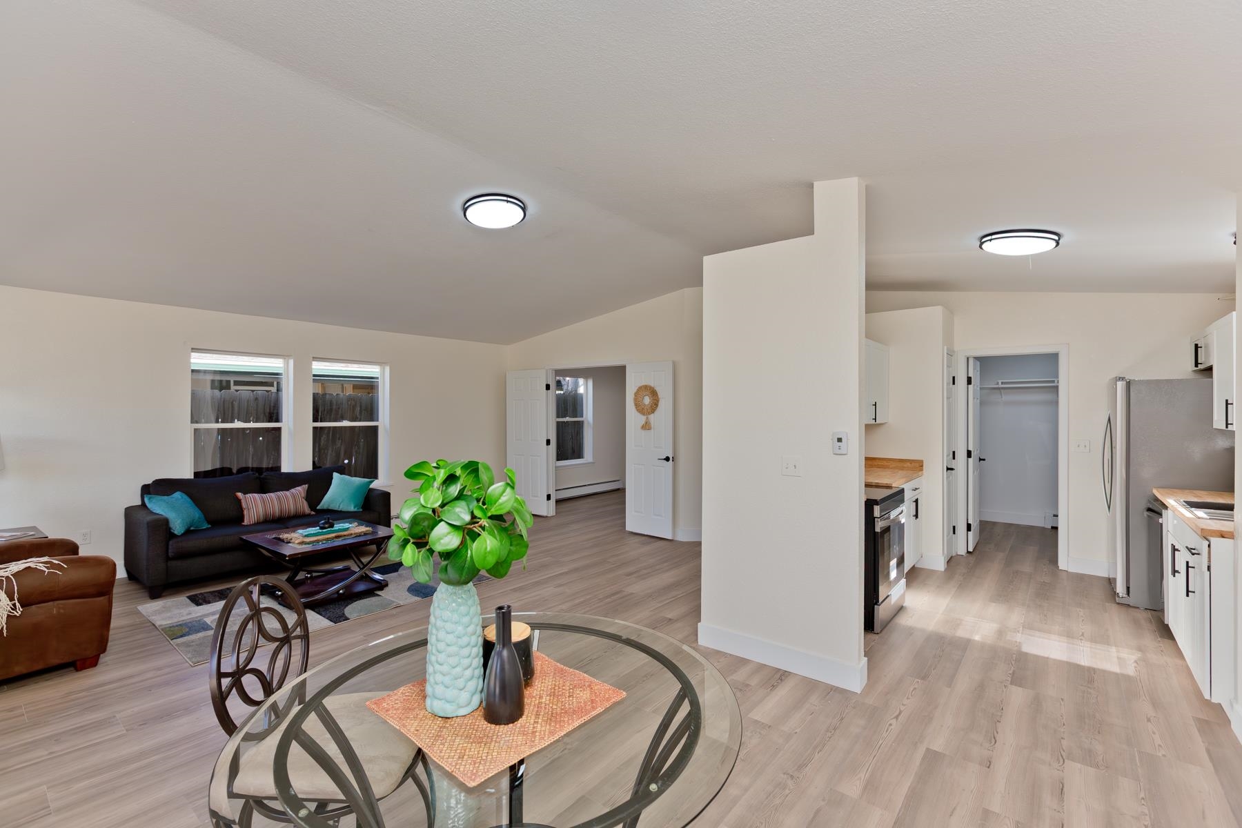 634 1/2 Colony Road Clifton, CO 81520 - Photo 6 of 42 a dining room with furniture and wooden floor