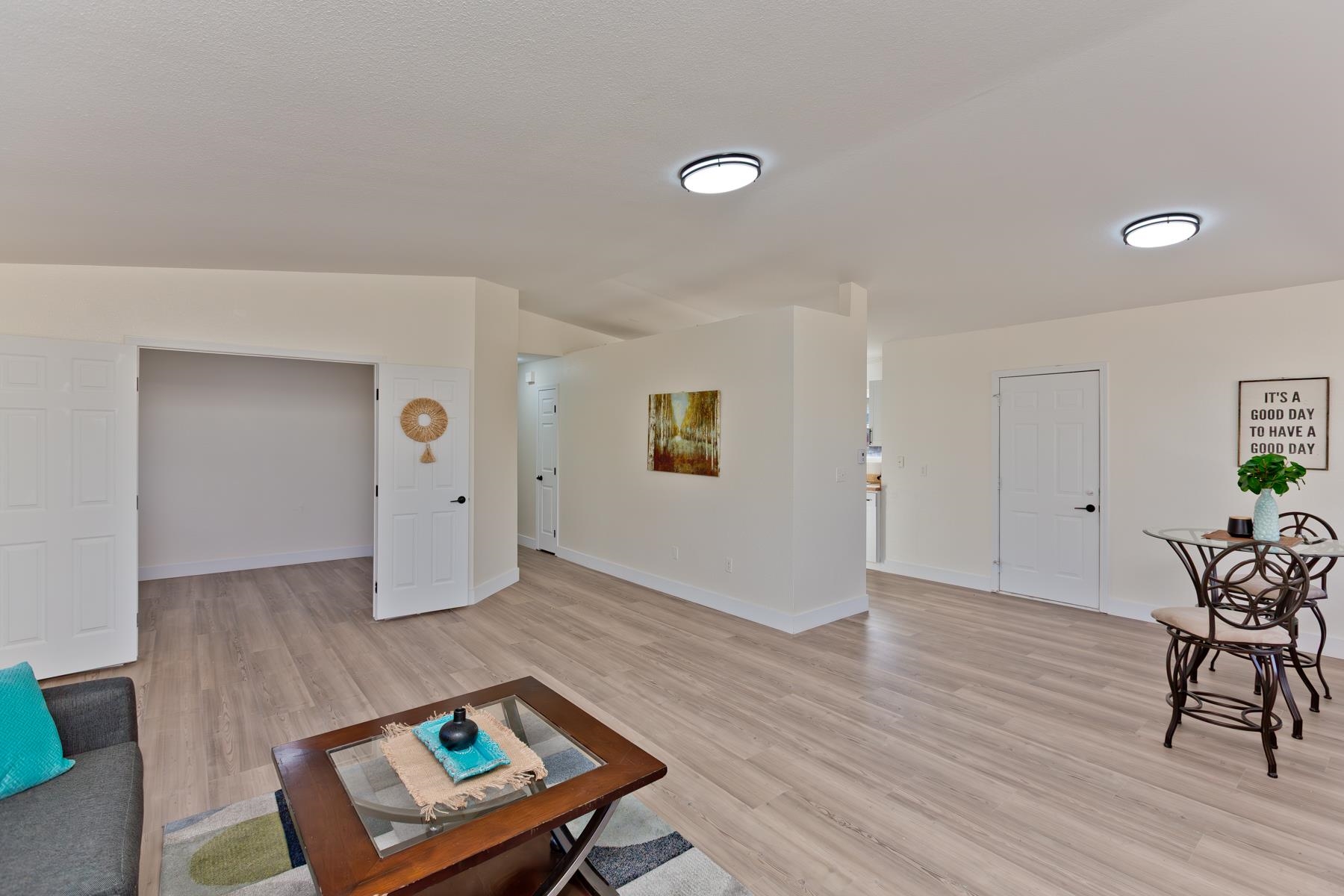 634 1/2 Colony Road Clifton, CO 81520 - Photo 8 of 42 a living room with furniture and wooden floor