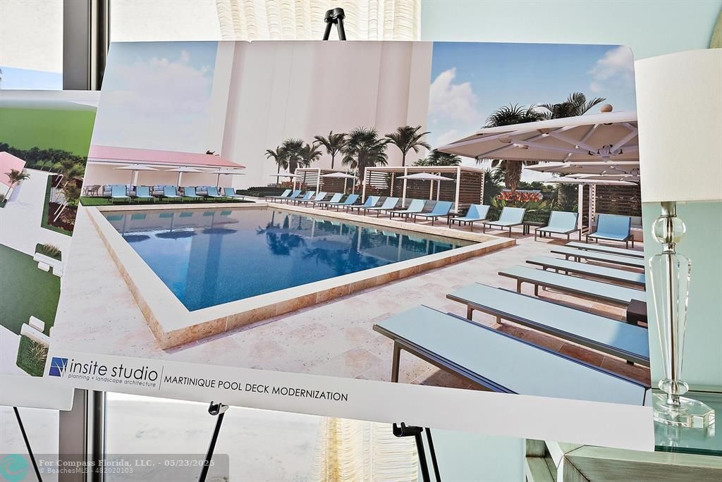 4100 North Ocean Drive, Unit 1804 Riviera Beach, FL 33404 - Photo 27 of 30 a view of a swimming pool with outdoor seating and a potted plant