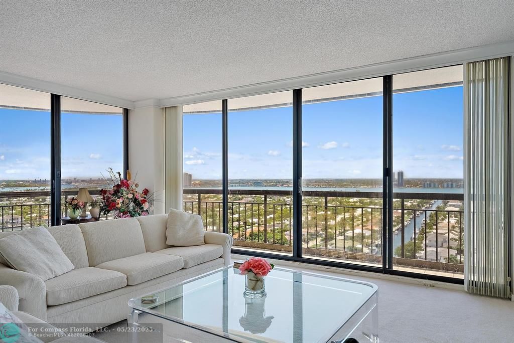 4100 North Ocean Drive, Unit 1804 Riviera Beach, FL 33404 - Photo 5 of 30 a living room with furniture and a large window
