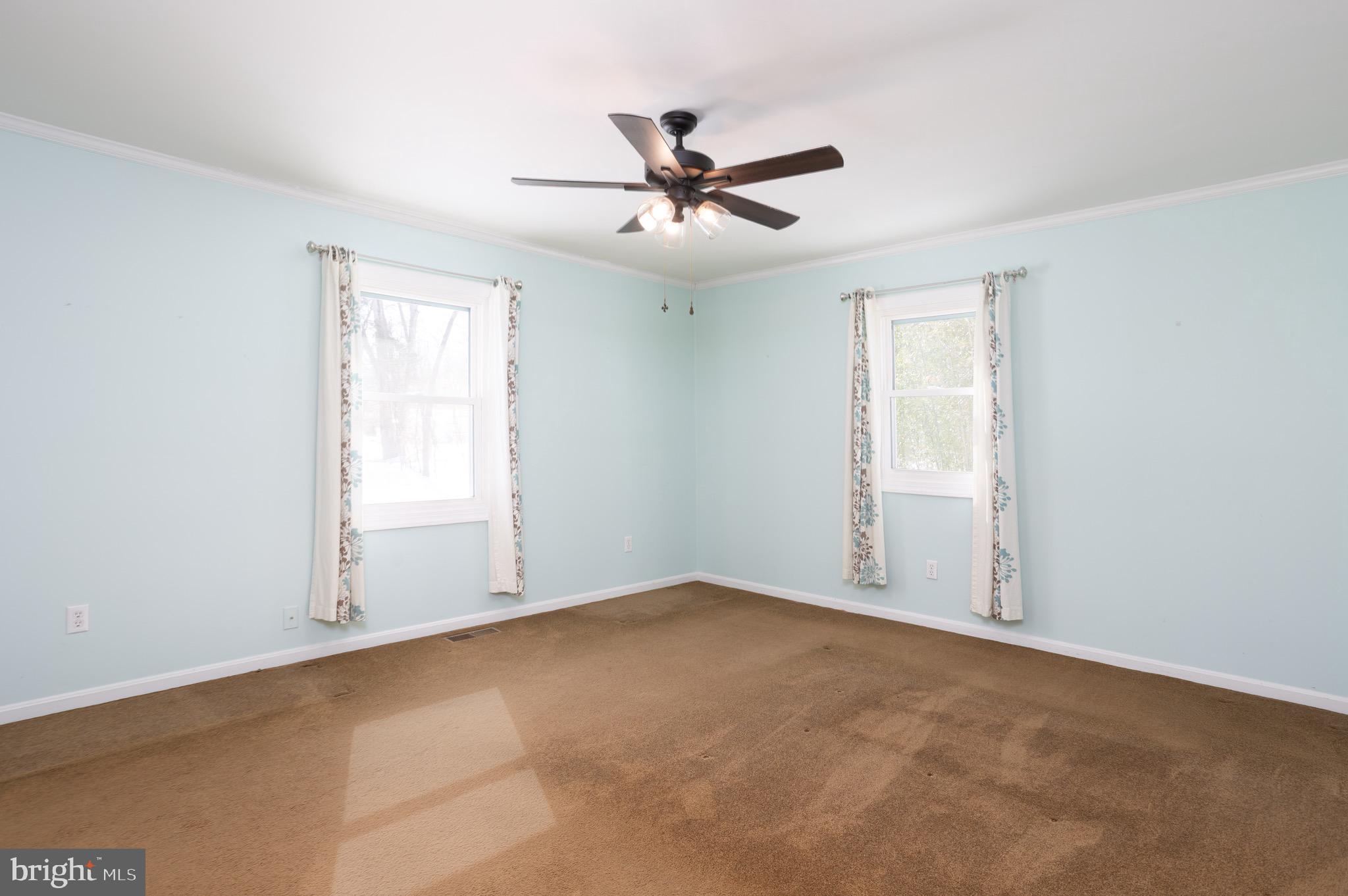 25999 Fox Grape Road Greensboro, MD 21639 - Photo 14 of 23 an empty room with closet and windows