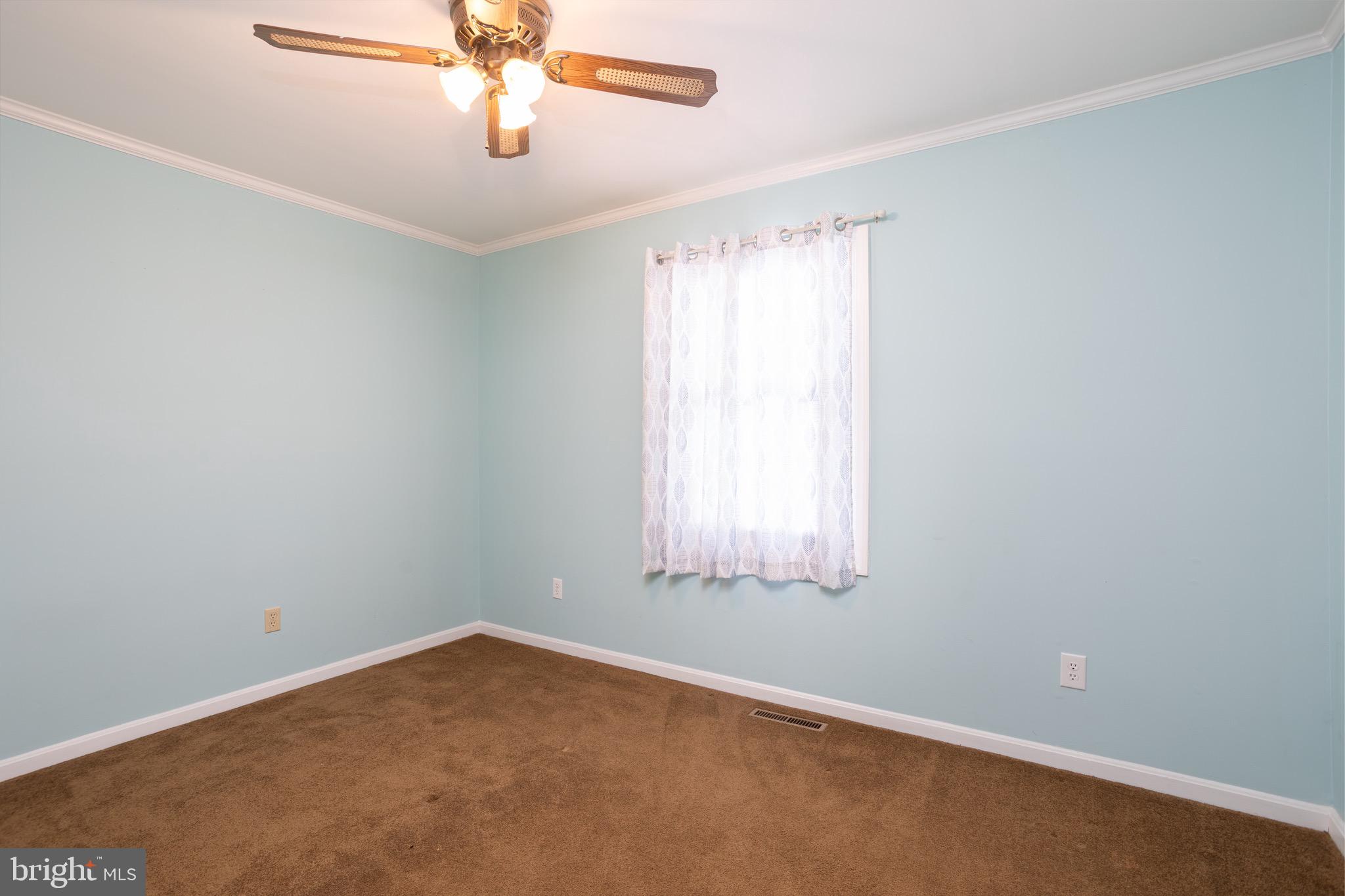 25999 Fox Grape Road Greensboro, MD 21639 - Photo 17 of 23 an empty room with a window