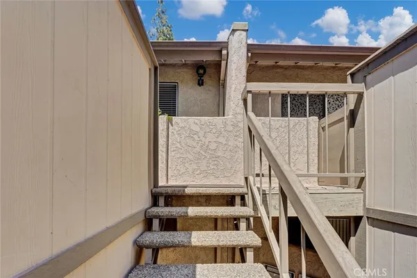 a view of entryway with a front door
