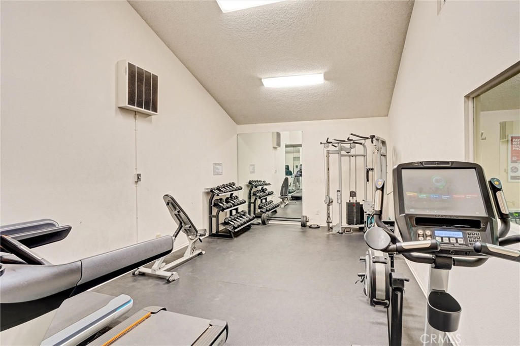 3010 Associated Road, Unit 133 Fullerton, CA 92835 - Photo 35 of 48 a view of a room with gym equipment