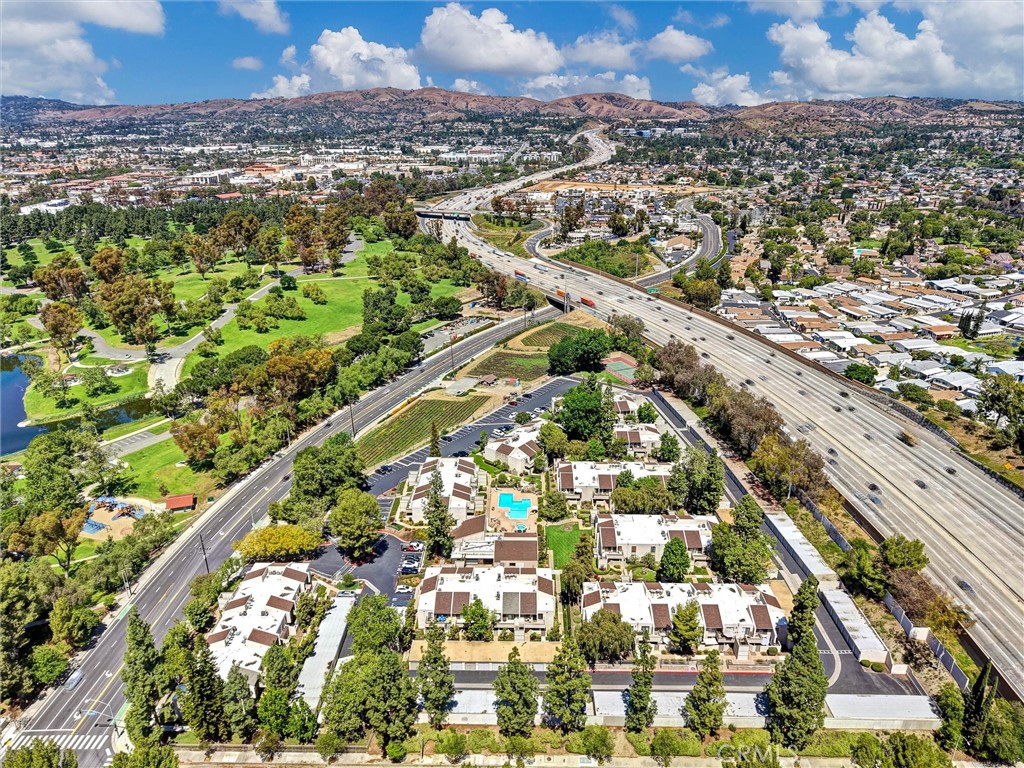 3010 Associated Road, Unit 133 Fullerton, CA 92835 - Photo 40 of 48 an aerial view of residential houses with city view
