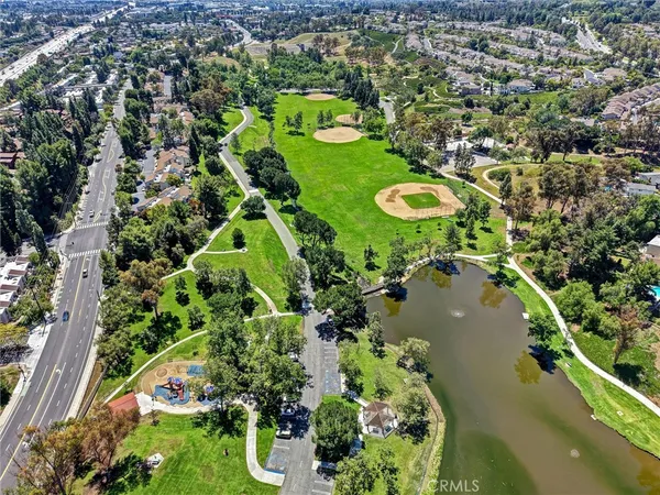 a view of a golf course with a swimming pool