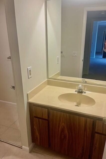 1817 18th Court, Unit 1817 Jupiter, FL 33477 - Photo 15 of 18 a bathroom with a sink and a mirror