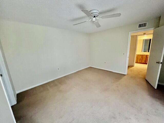 1817 18th Court, Unit 1817 Jupiter, FL 33477 - Photo 10 of 18 an empty room with a bathroom