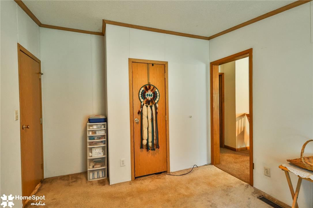 3795 Rhoades Road Kempton, PA 19529 - Photo 17 of 42 A versatile room provides access to other areas of the residence.