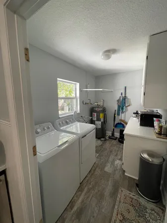 a room with a storage and utility