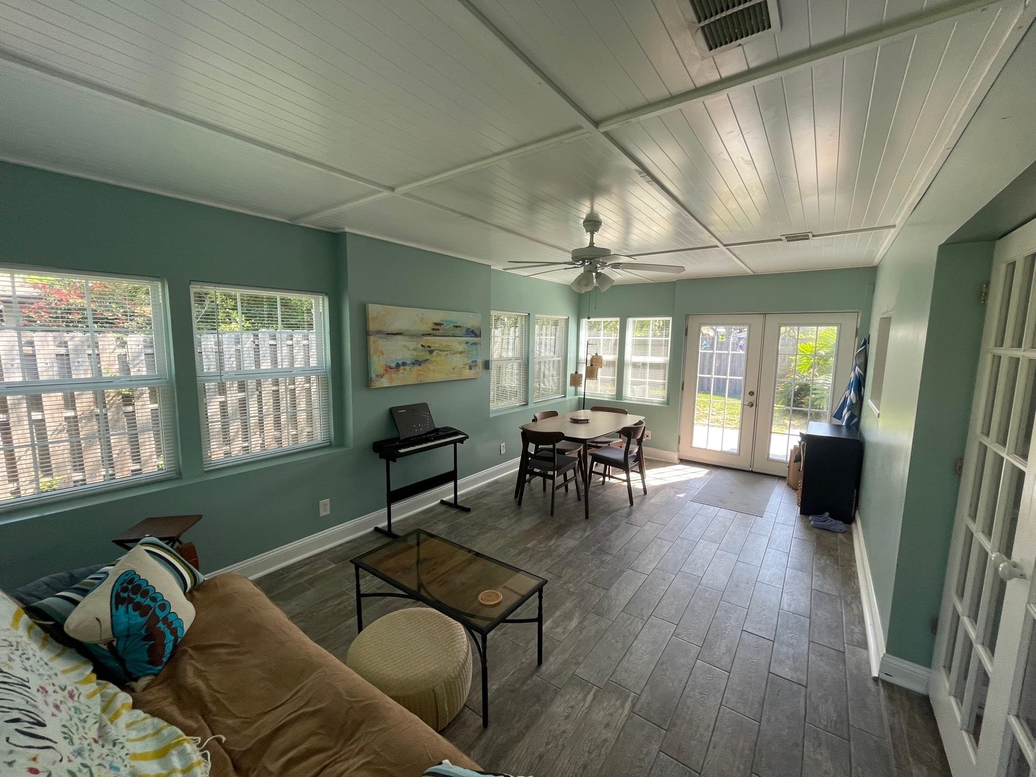 250 Tropic Way St. Augustine, FL 32080 - Photo 8 of 16 a living room with furniture and a wooden floor