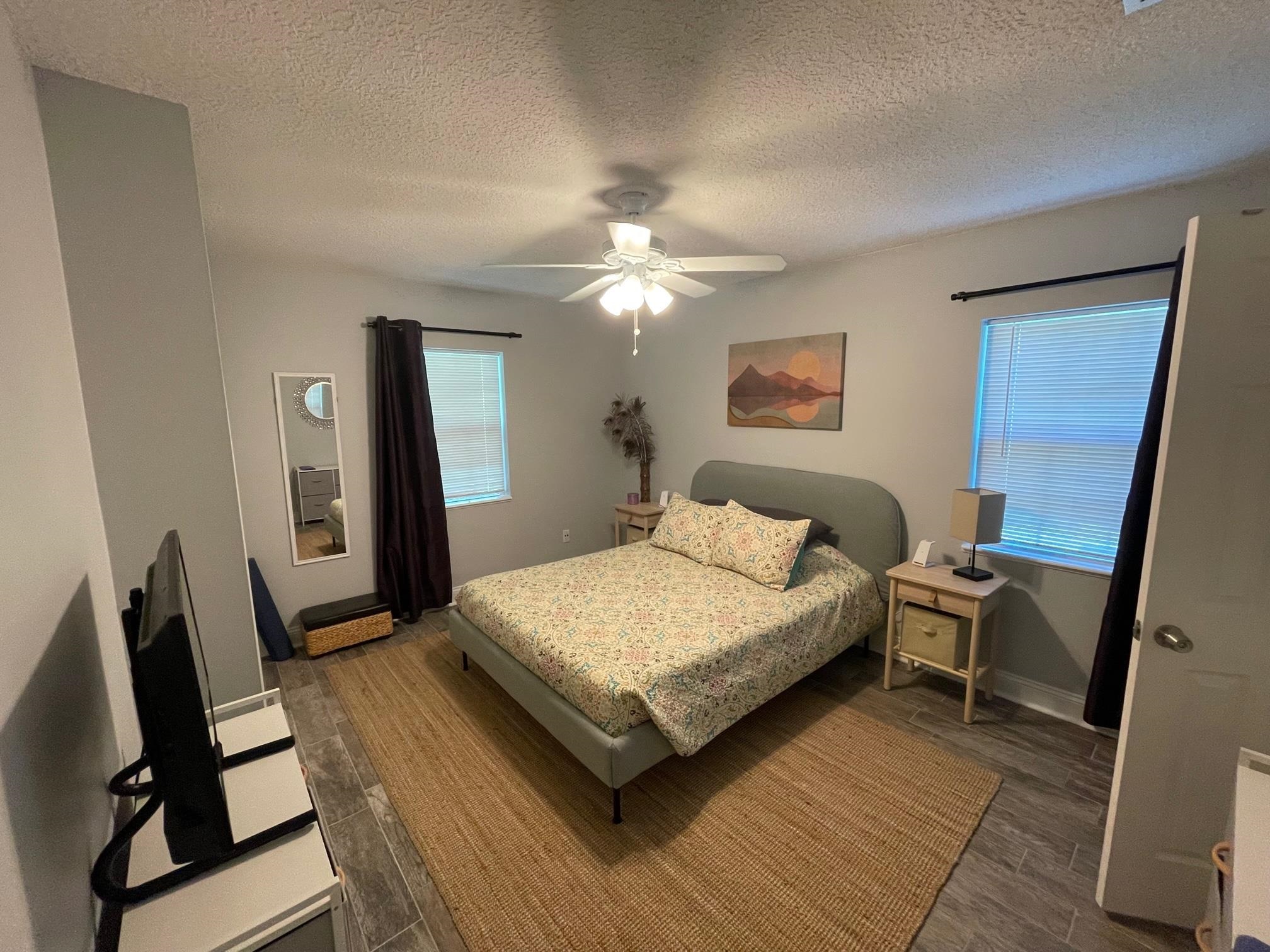 250 Tropic Way St. Augustine, FL 32080 - Photo 9 of 16 a bedroom with a bed and a chair