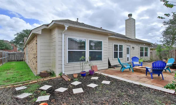 a front view of a house with patio