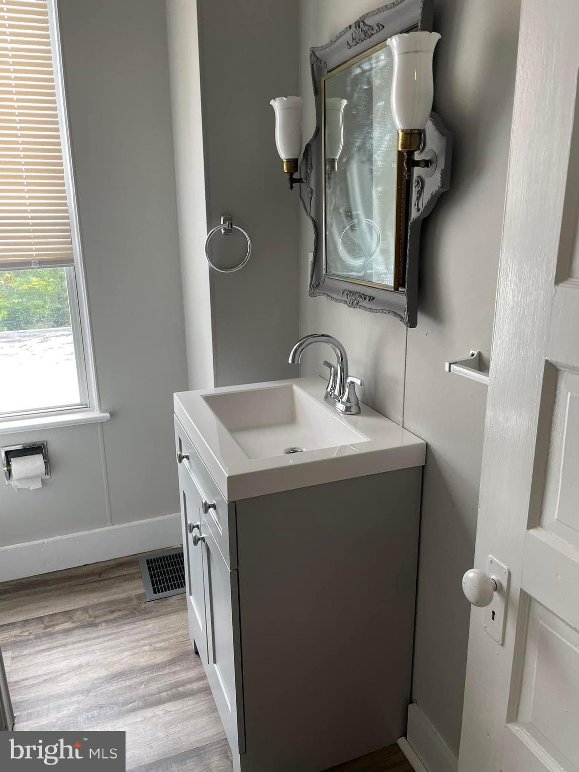 246 West Front Street Florence, NJ 08518 - Photo 5 of 9 a bathroom with a sink and mirror with toilet