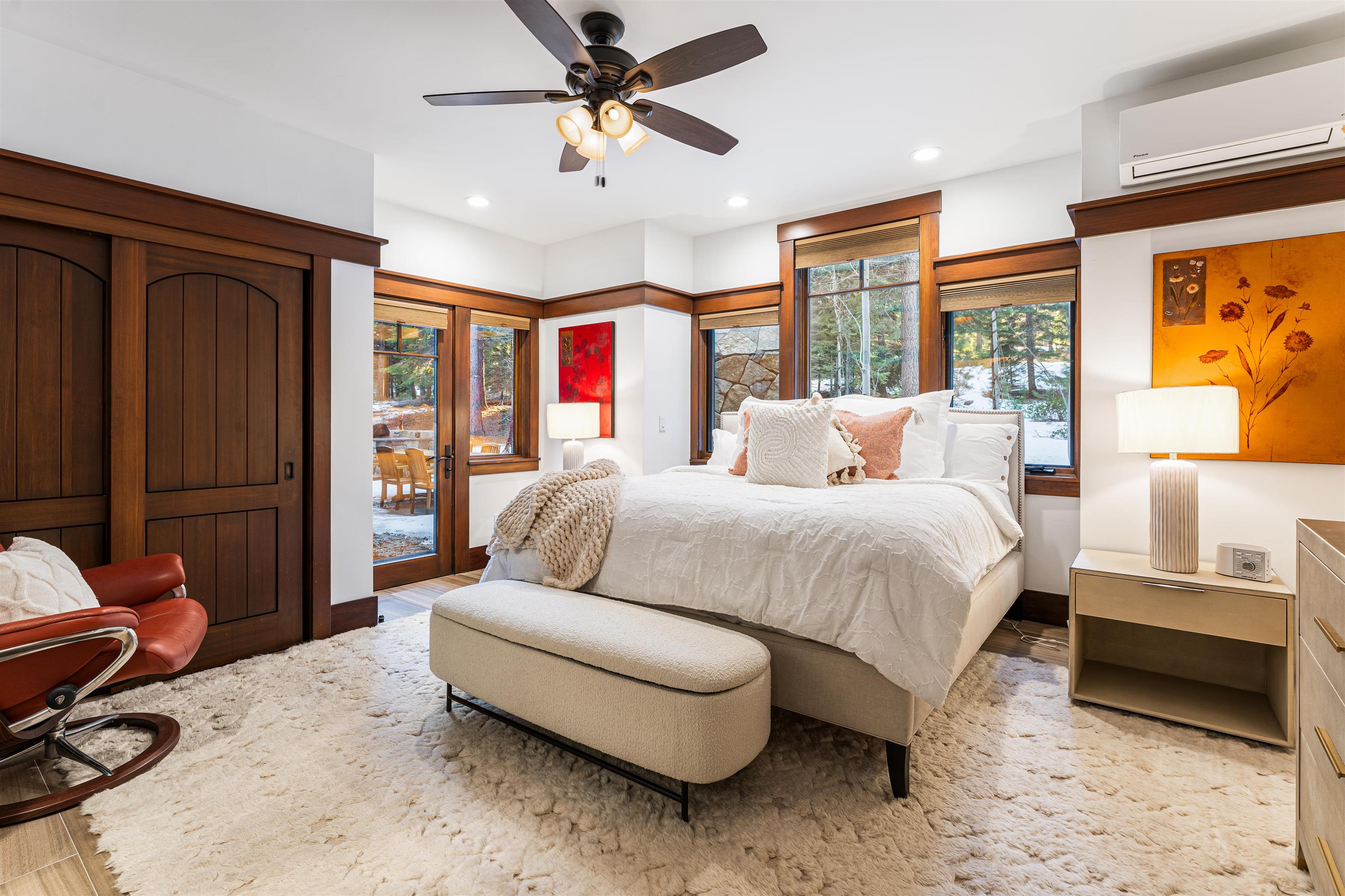 123 Dave Dysart Truckee, CA 96161 - Photo 12 of 28 a bedroom with a bed a couch and a window