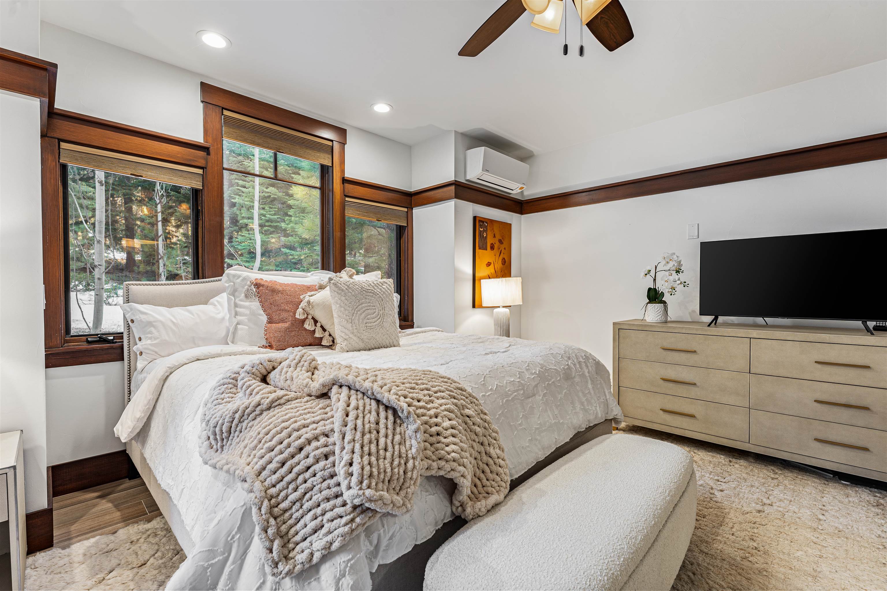 123 Dave Dysart Truckee, CA 96161 - Photo 13 of 28 a bedroom with a bed and a flat screen tv