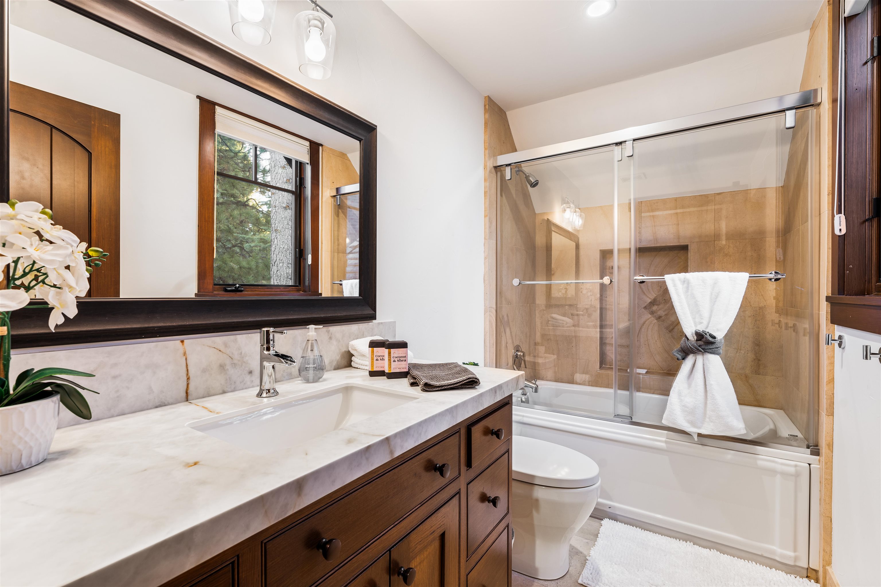 123 Dave Dysart Truckee, CA 96161 - Photo 21 of 28 a bathroom with a sink a toilet and shower