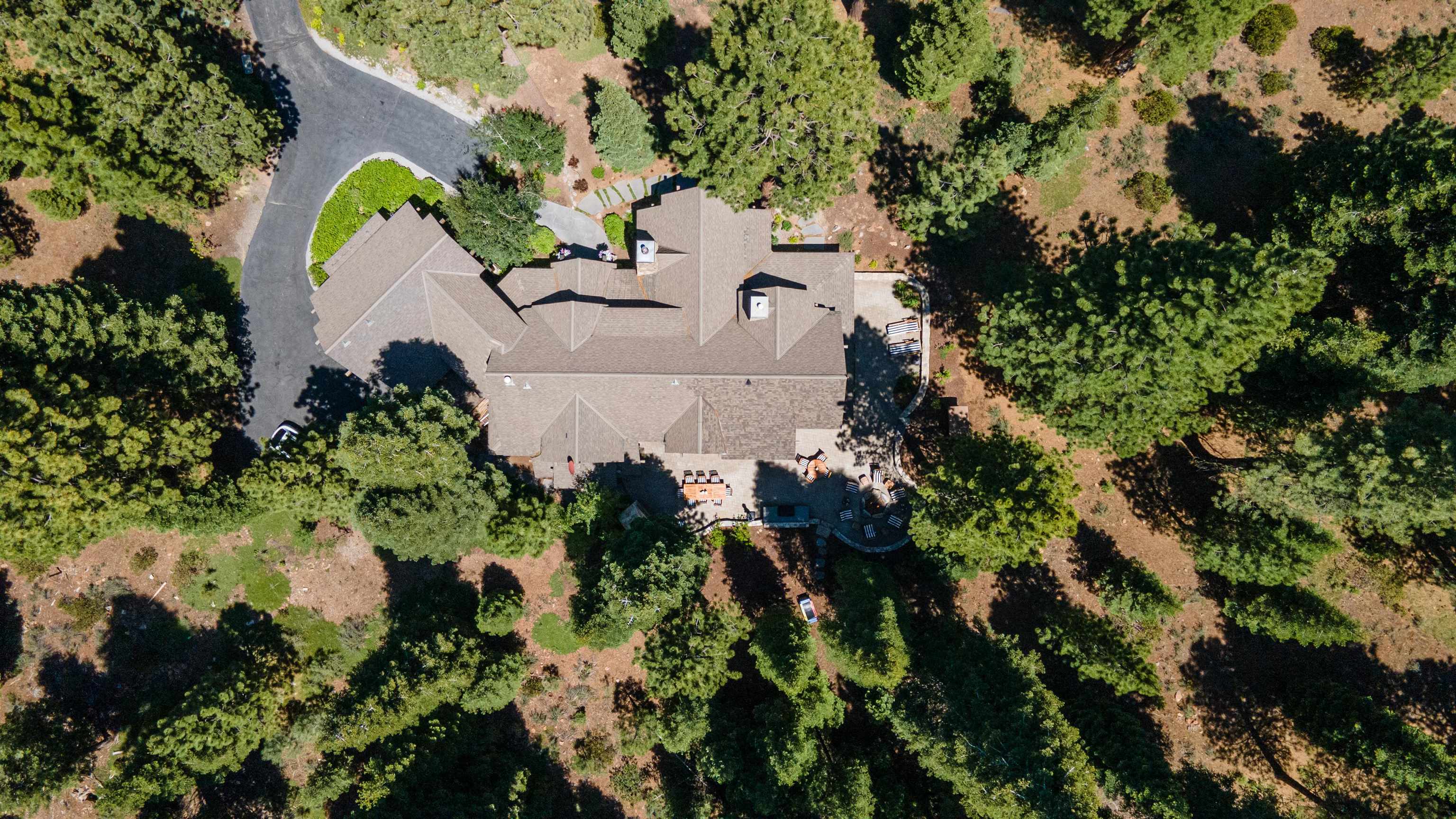 123 Dave Dysart Truckee, CA 96161 - Photo 23 of 28 an aerial view of a house with a yard and a garden
