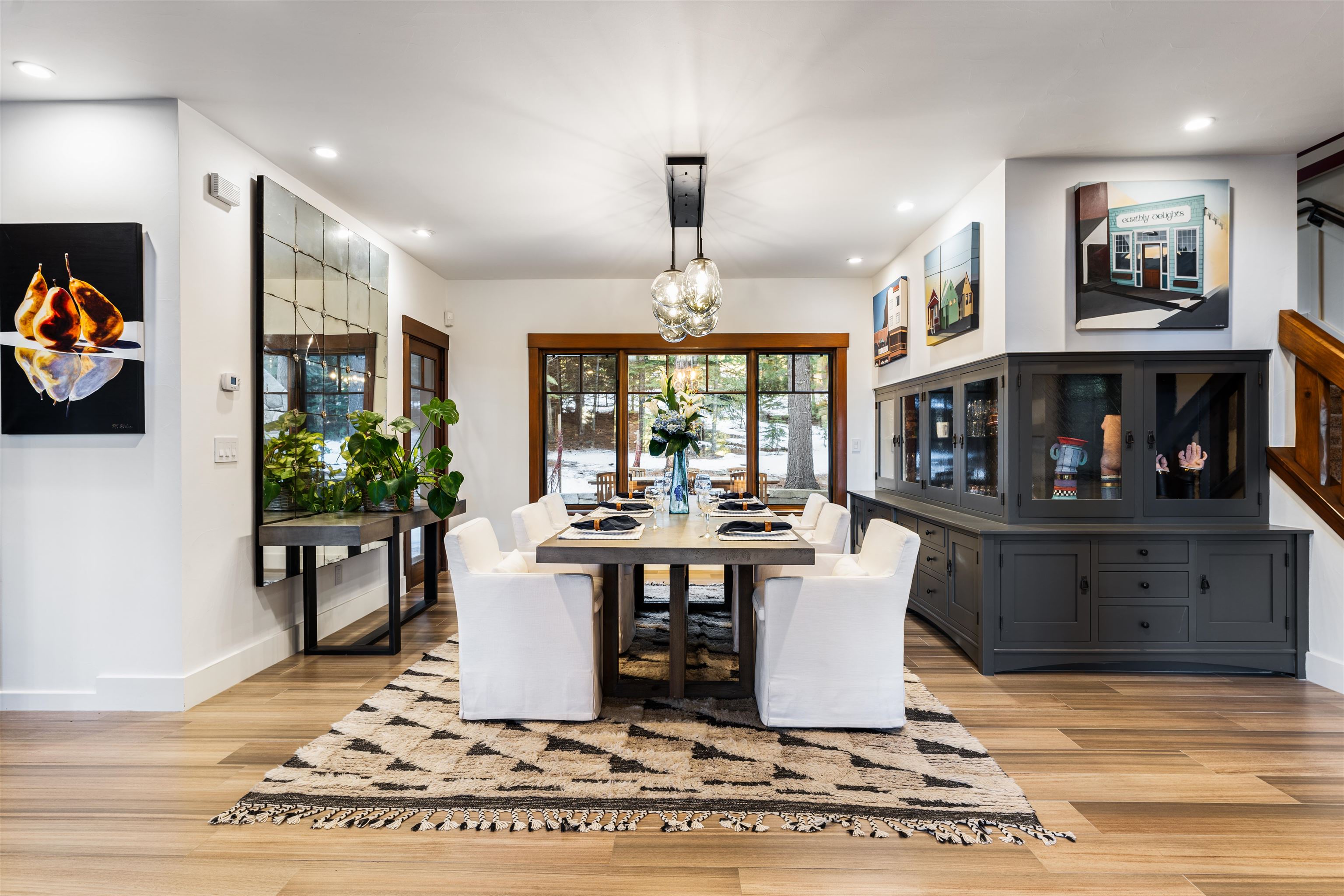 123 Dave Dysart Truckee, CA 96161 - Photo 7 of 28 a living room with furniture and a dining table with wooden floor