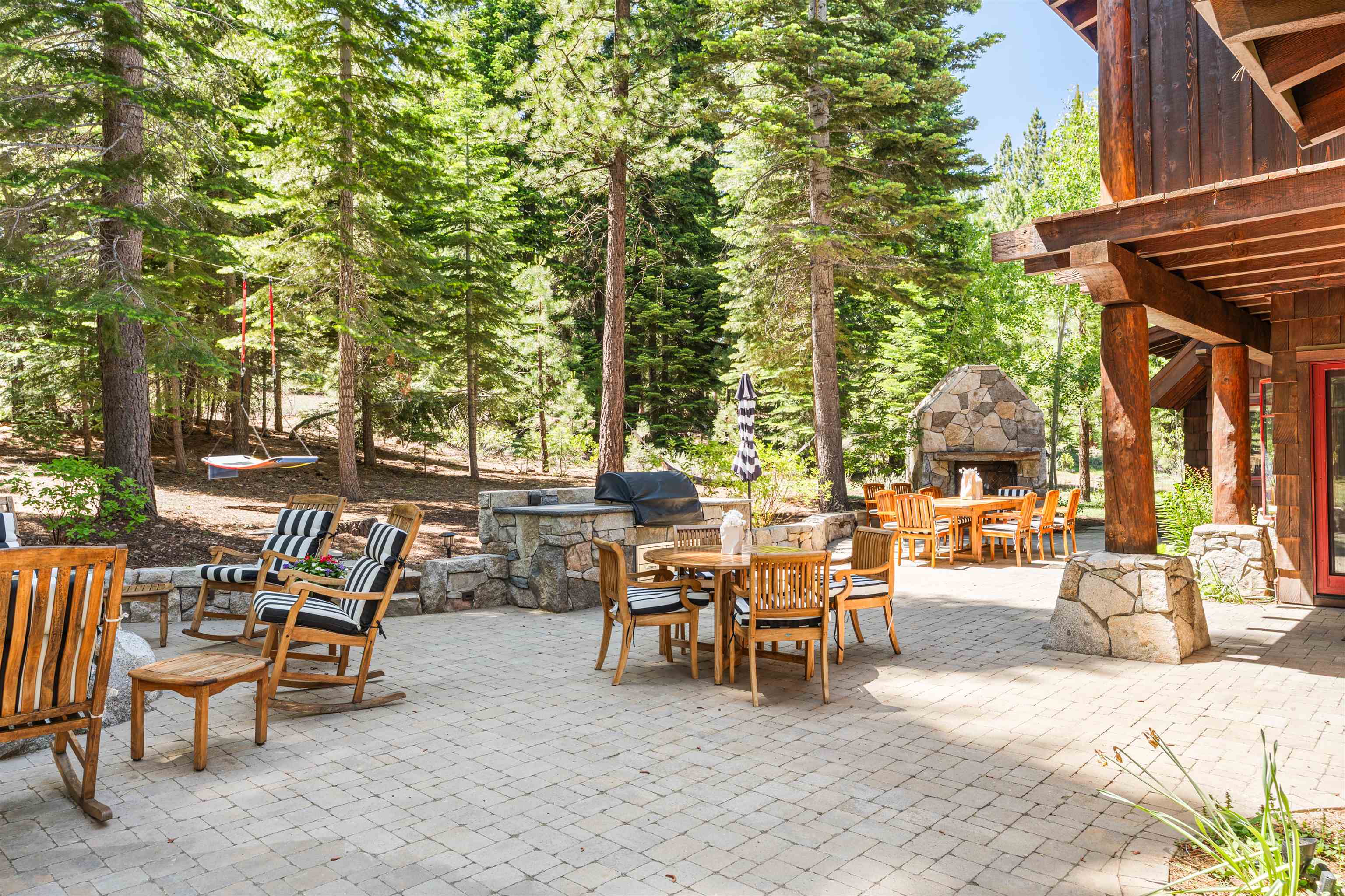 123 Dave Dysart Truckee, CA 96161 - Photo 10 of 28 a view of a patio with table and chairs and potted plants