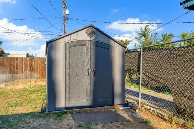 a view of a wooden fence