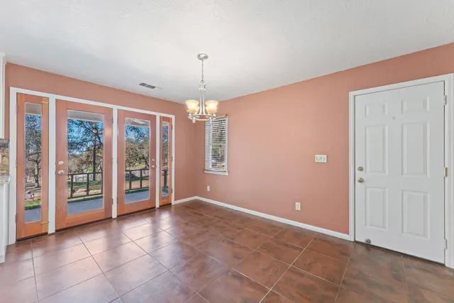 a kitchen with a sink stove and refrigerator