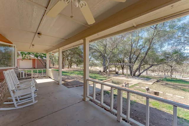 a view of a kitchen with a sink and a window