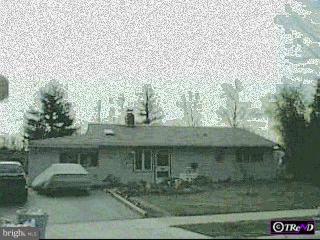 83 Gridiron Road Levittown, PA 19057 - Photo 1 of 1 a view of a street with a building in the background