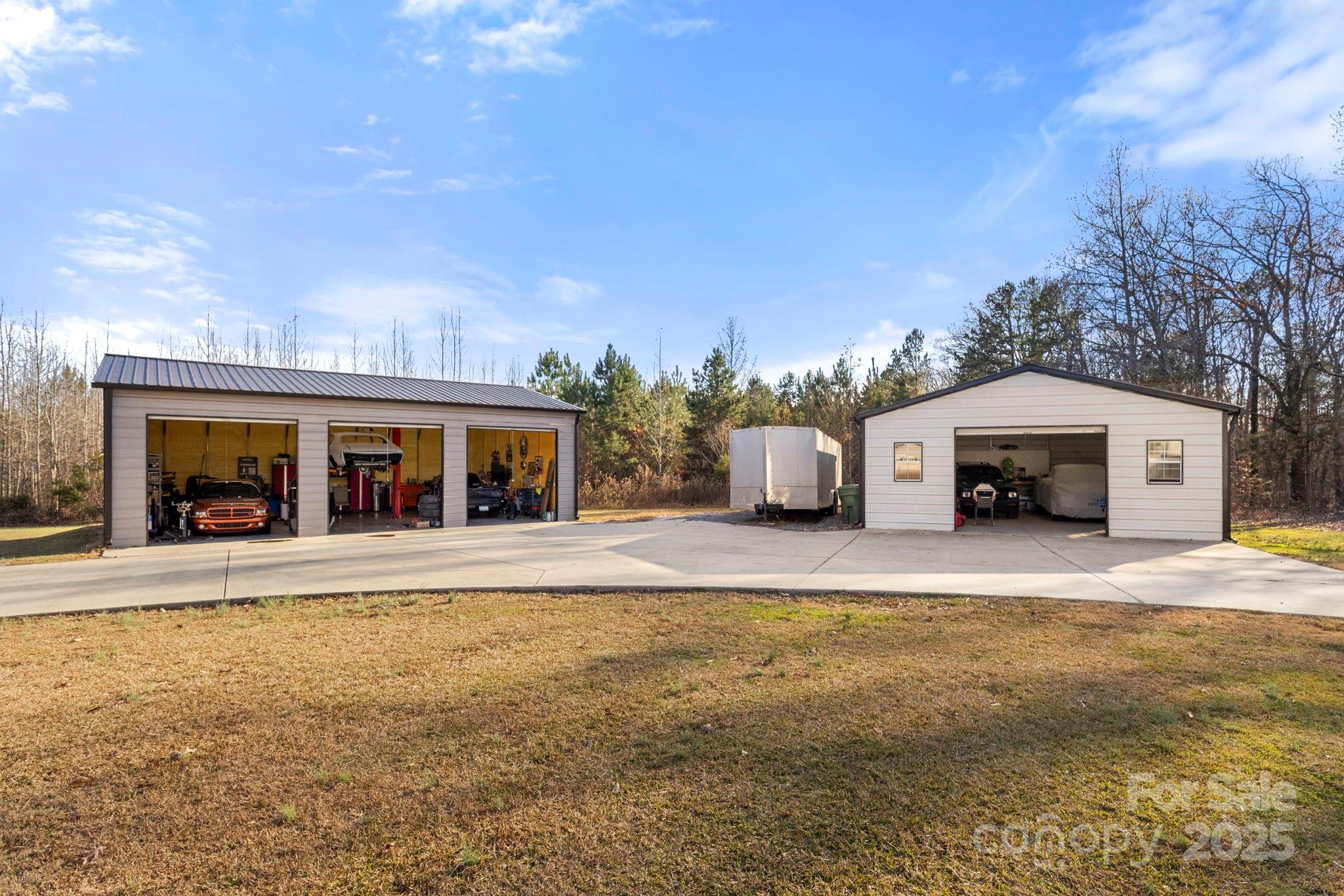 4290 Palmer Lloyd Road Lancaster, SC 29720 - Photo 20 of 48 a front view of a house with a yard and car parked
