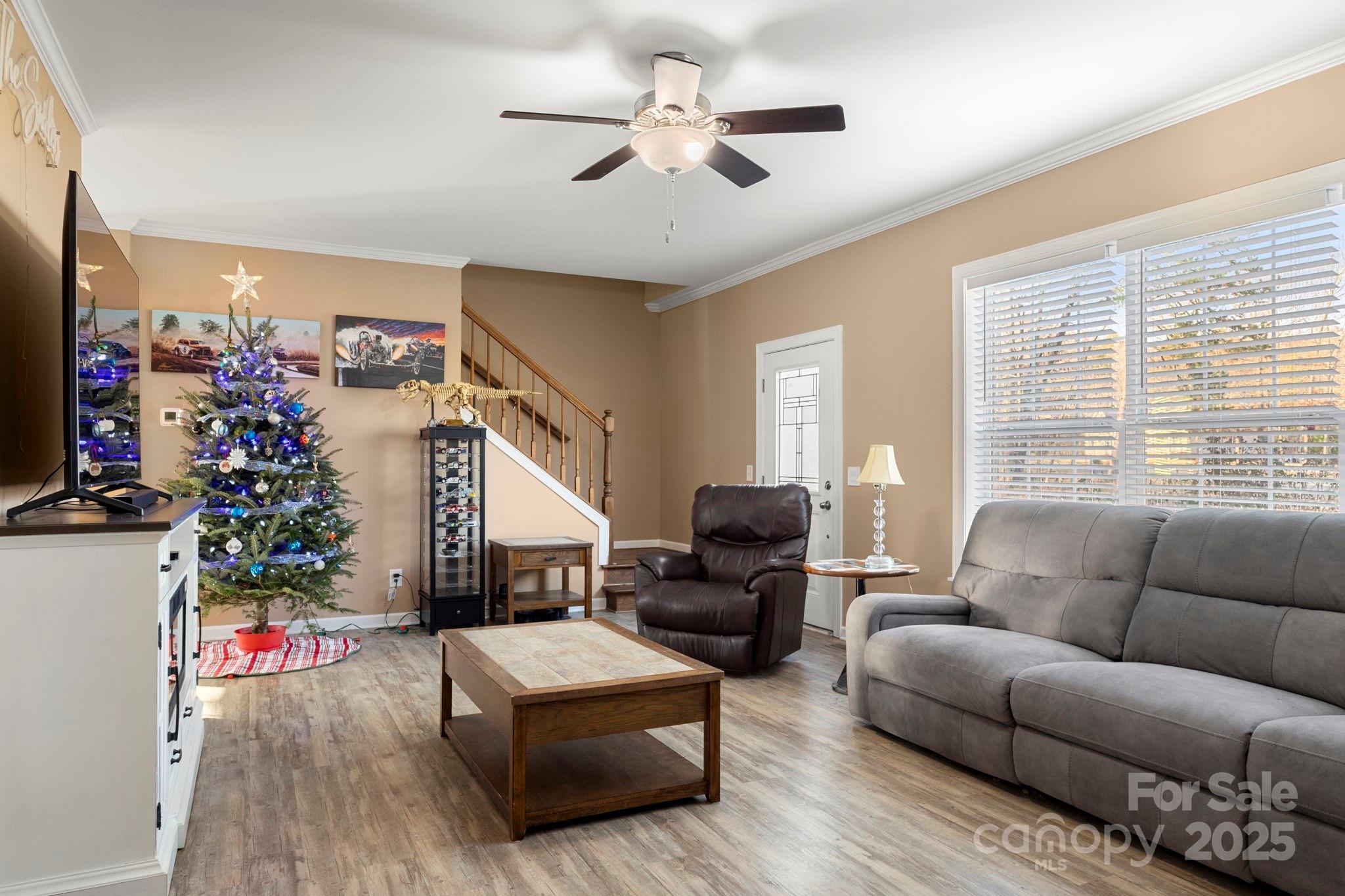 4290 Palmer Lloyd Road Lancaster, SC 29720 - Photo 21 of 48 a living room with furniture chandelier and a flat screen tv