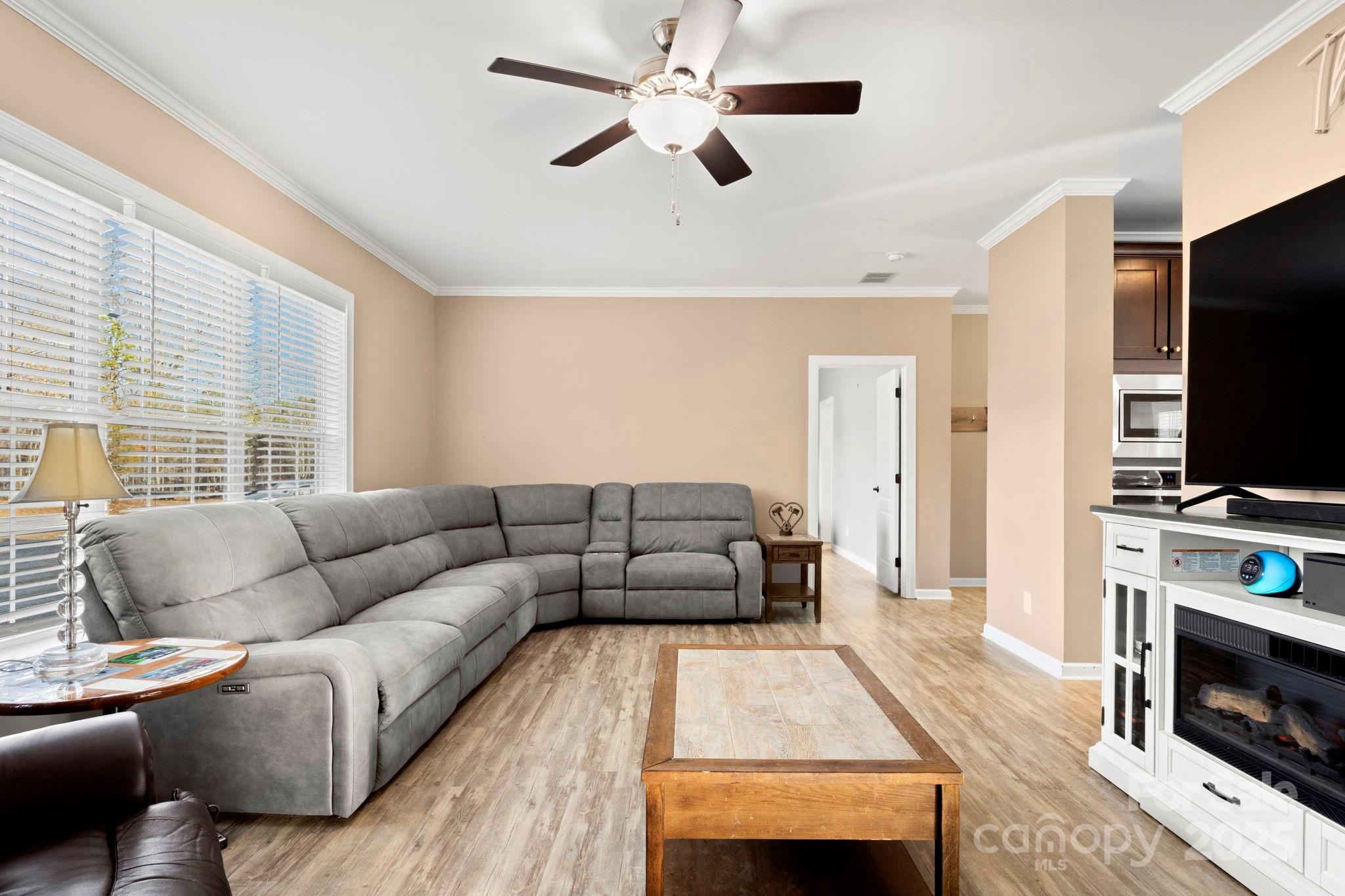 4290 Palmer Lloyd Road Lancaster, SC 29720 - Photo 22 of 48 a living room with furniture and a flat screen tv