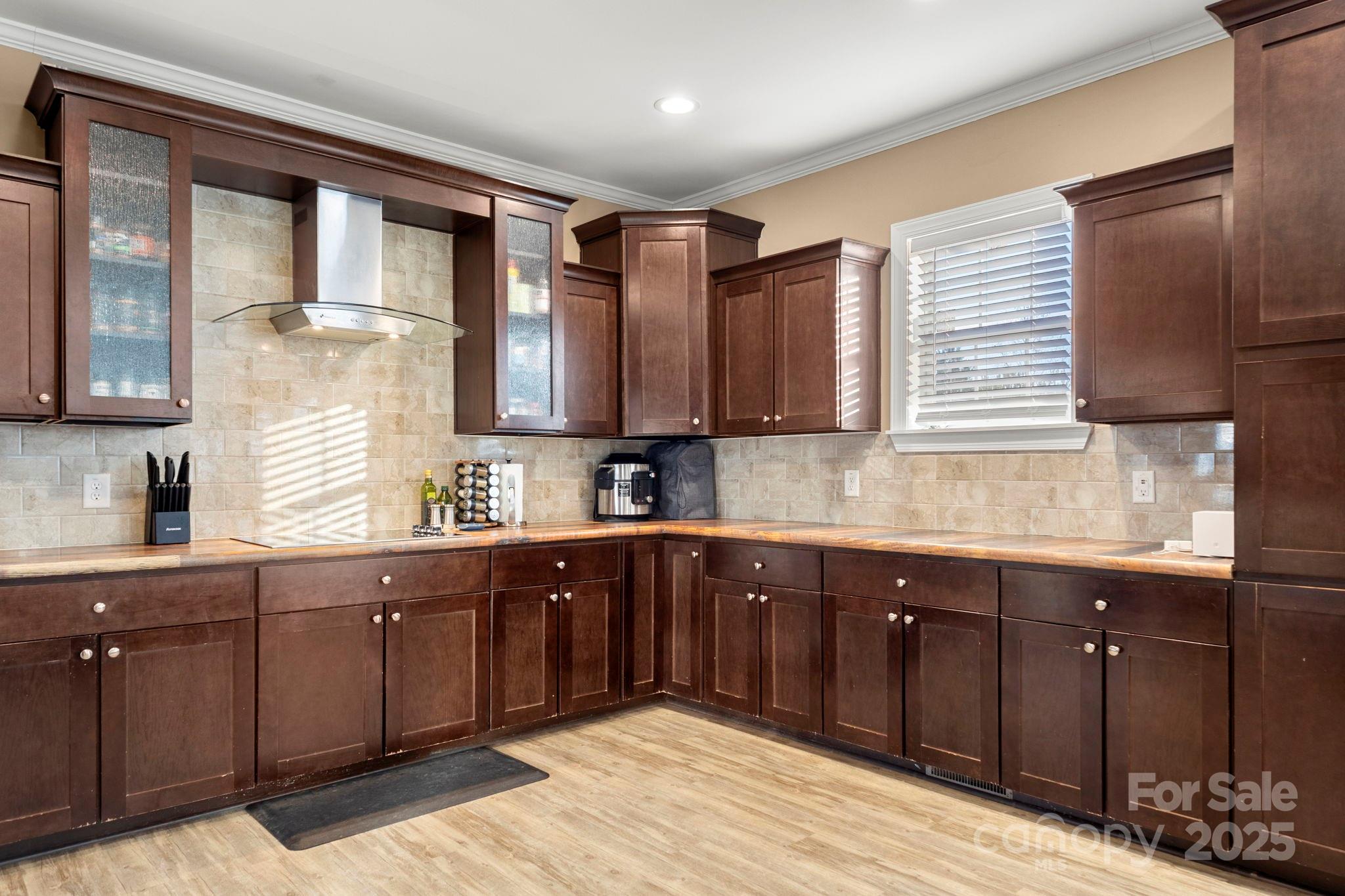 4290 Palmer Lloyd Road Lancaster, SC 29720 - Photo 26 of 48 a kitchen with stainless steel appliances granite countertop cabinets and window