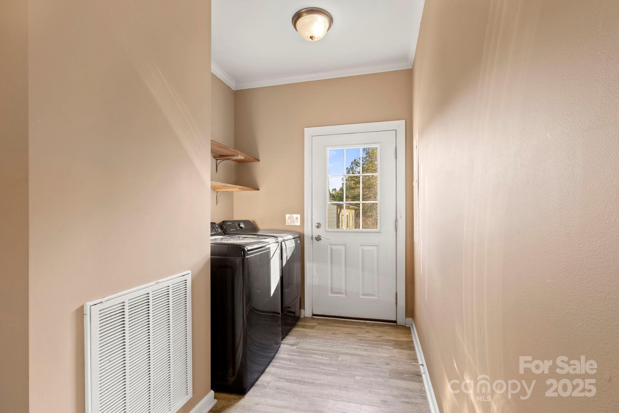 4290 Palmer Lloyd Road Lancaster, SC 29720 - Photo 38 of 48 a kitchen with a stove and a refrigerator