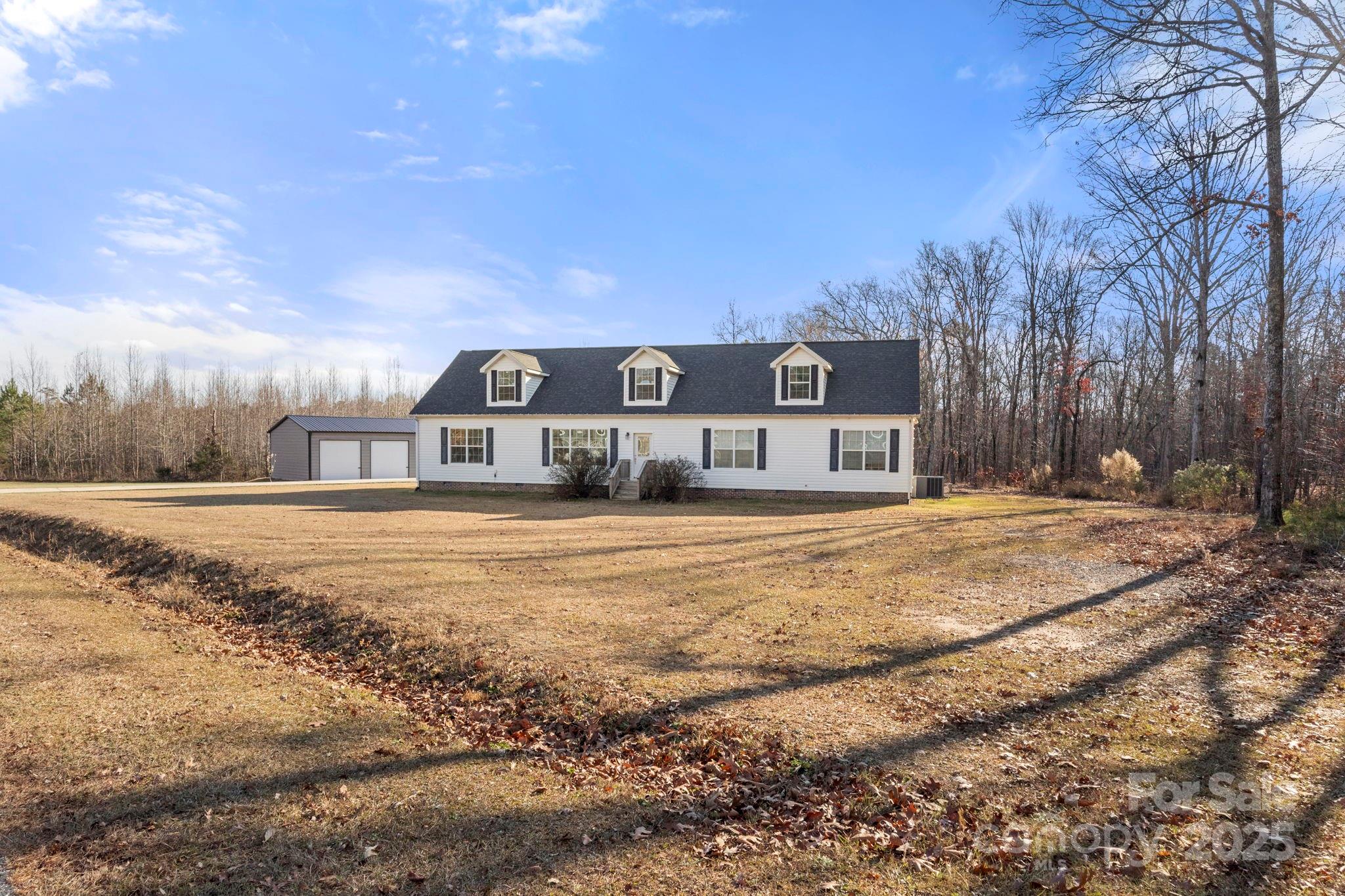 4290 Palmer Lloyd Road Lancaster, SC 29720 - Photo 5 of 48 a front view of a house with a yard covered with snow