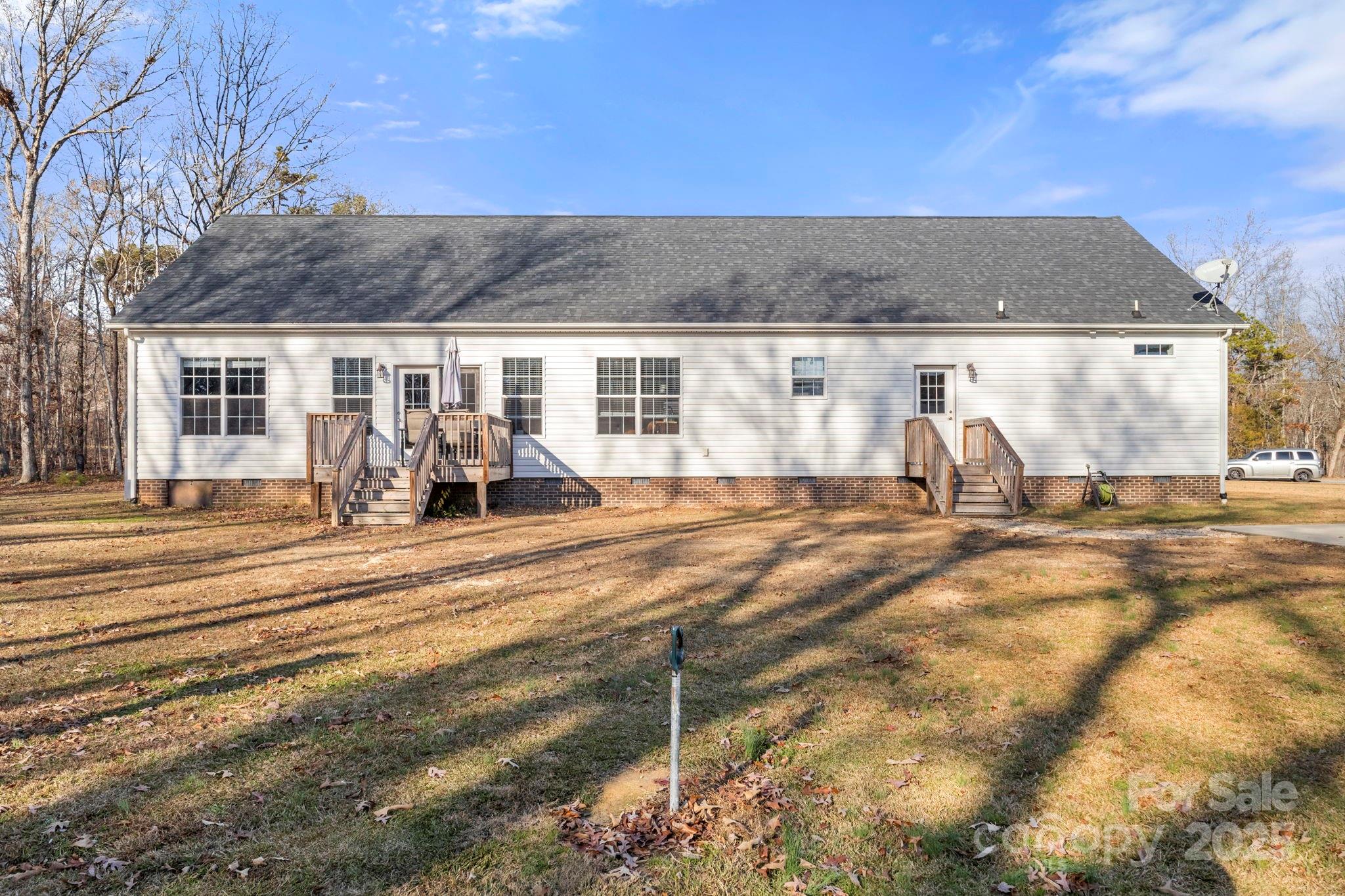 4290 Palmer Lloyd Road Lancaster, SC 29720 - Photo 9 of 48 a view of a house with a backyard