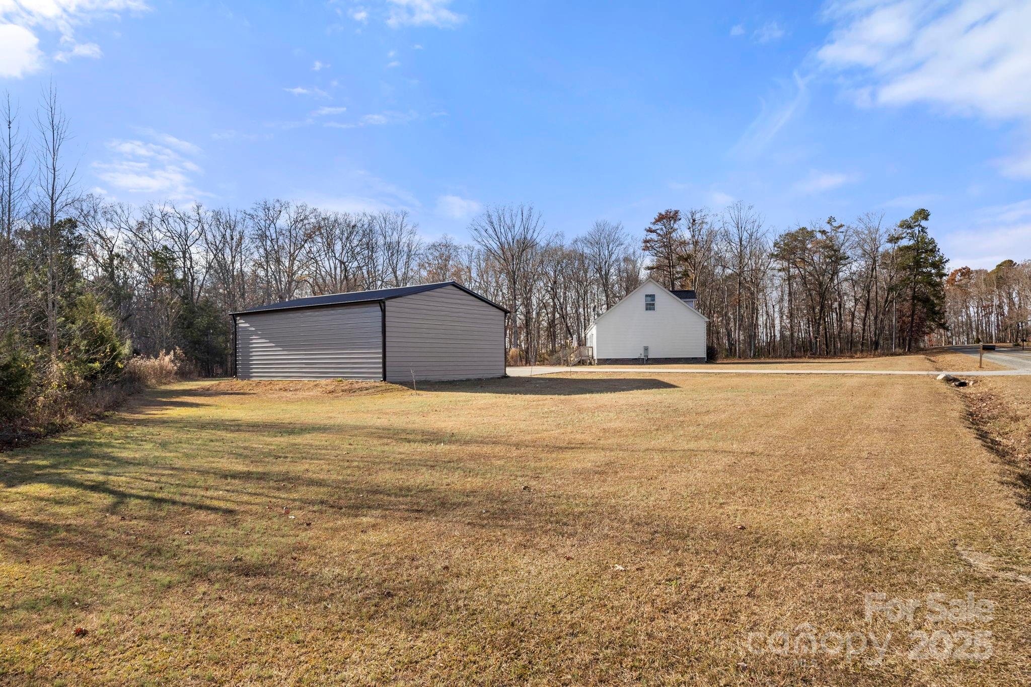 4290 Palmer Lloyd Road Lancaster, SC 29720 - Photo 10 of 48 a house view with large trees
