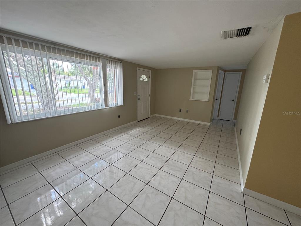 3049 Moog Road Holiday, FL 34691 - Photo 5 of 19 a view of an empty room and window
