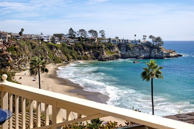 a view of a balcony with an ocean view