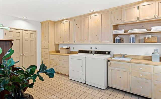 a view of cabinets with wooden floor