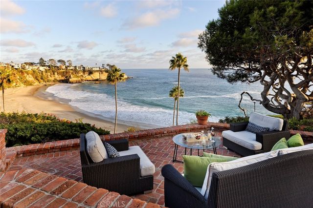 a outdoor living space with furniture and city view