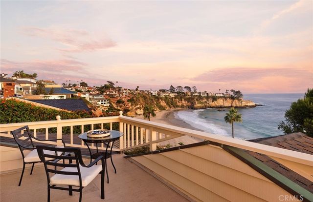a view of a chairs and table on the terrace